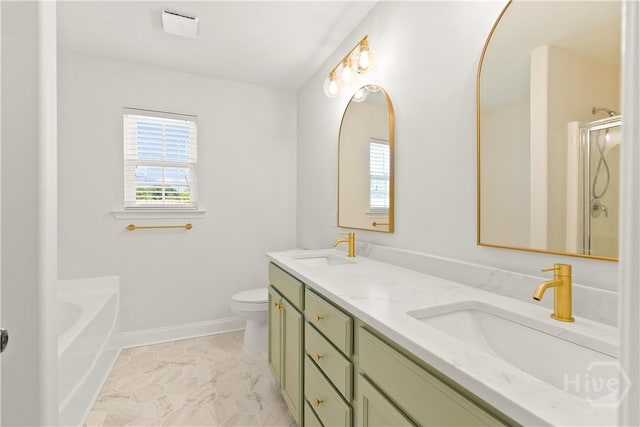 164 Whirlwind Way, Guyton, GA 31312 - bathroom featuring double vanity, a garden tub, and a shower with shower door