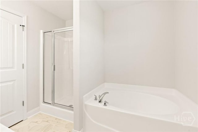 164 Whirlwind Way, Guyton, GA 31312 - full bathroom with a shower stall and a garden tub