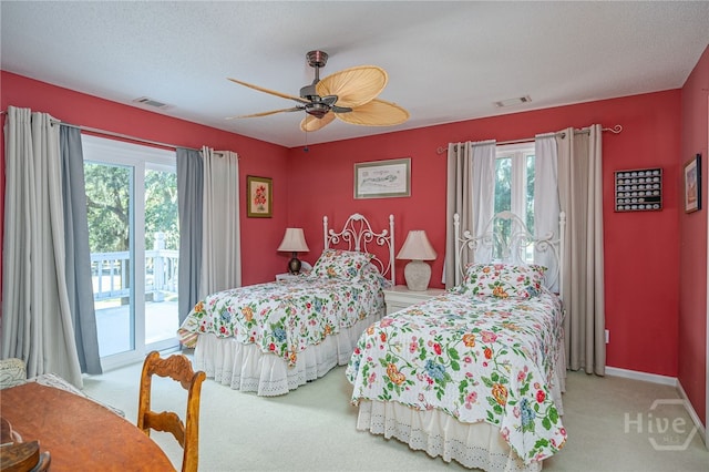 1 Hobcaw Ln, Savannah, GA 31411 - bedroom featuring access to outside, multiple windows, and carpet floors