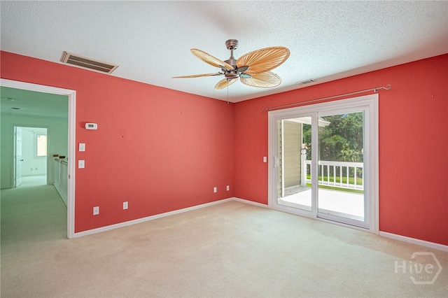 1 Hobcaw Ln, Savannah, GA 31411 - spare room with light carpet, ceiling fan, and a textured ceiling