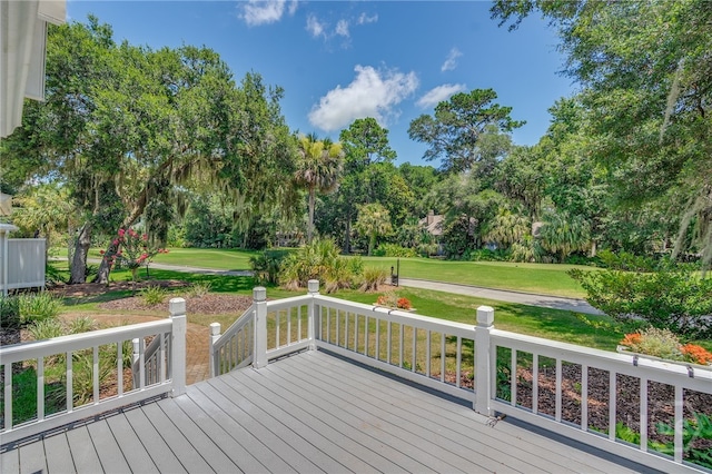 1 Hobcaw Ln, Savannah, GA 31411 - wooden deck featuring view of wooded area and a yard