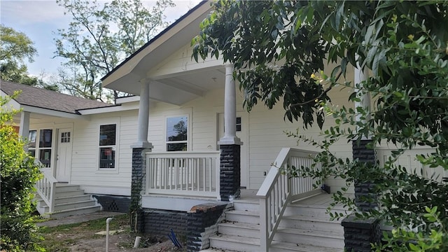 8-10 Mastick St, Savannah, GA 31404 - view of exterior entry featuring covered porch