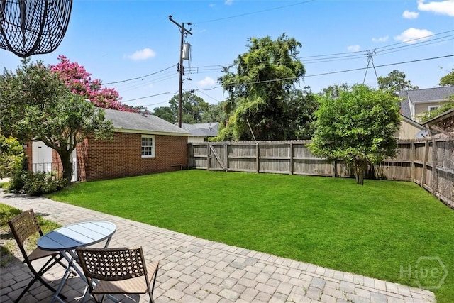 540 E 60th St, Savannah, GA 31405 - fenced backyard featuring a patio