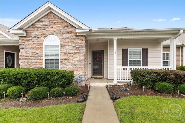 19 Travertine Cir, Savannah, GA 31419 - view of front of property featuring a porch and stone siding