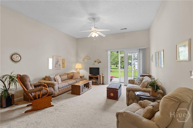 19 Travertine Cir, Savannah, GA 31419 - carpeted living area with a ceiling fan and a textured ceiling