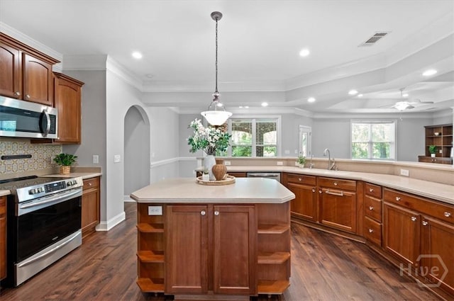 2604 River Oaks Dr Unit 2604, Richmond Hill, GA 31324 - kitchen with appliances with stainless steel finishes, open shelves, light countertops, recessed lighting, and dark wood finished floors