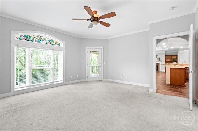 2604 River Oaks Dr Unit 2604, Richmond Hill, GA 31324 - empty room with carpet floors, ornamental molding, a ceiling fan, and arched walkways