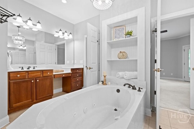 2604 River Oaks Dr Unit 2604, Richmond Hill, GA 31324 - full bath featuring a whirlpool tub, vanity, tile patterned floors, and a chandelier
