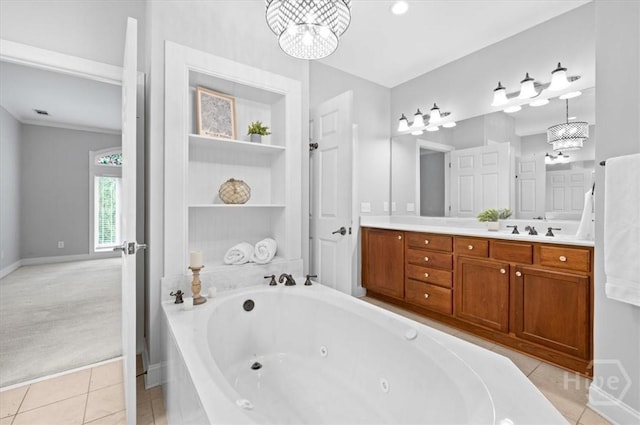 2604 River Oaks Dr Unit 2604, Richmond Hill, GA 31324 - bathroom featuring a chandelier, vanity, a tub with jets, and tile patterned floors