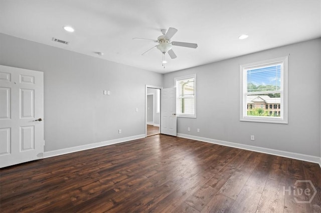 2604 River Oaks Dr Unit 2604, Richmond Hill, GA 31324 - unfurnished bedroom featuring dark wood-style floors, a ceiling fan, and recessed lighting