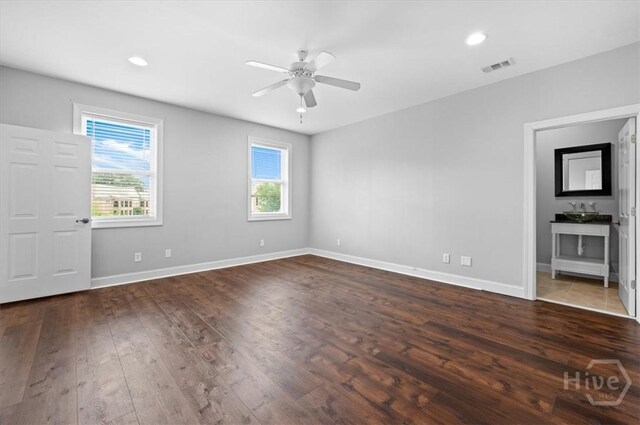2604 River Oaks Dr Unit 2604, Richmond Hill, GA 31324 - unfurnished bedroom with dark wood-type flooring, recessed lighting, and ceiling fan