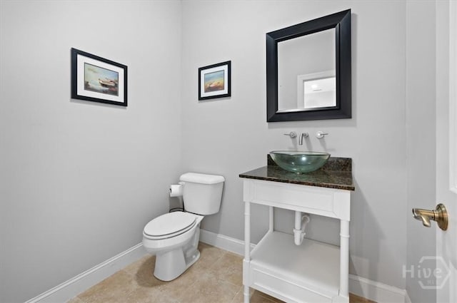 2604 River Oaks Dr Unit 2604, Richmond Hill, GA 31324 - half bathroom featuring vanity and tile patterned floors