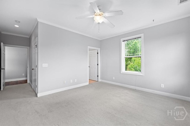 2604 River Oaks Dr Unit 2604, Richmond Hill, GA 31324 - spare room featuring ornamental molding, carpet flooring, ceiling fan, and a smoke detector