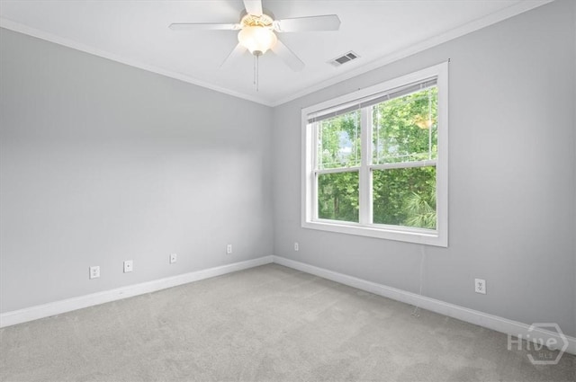 2604 River Oaks Dr Unit 2604, Richmond Hill, GA 31324 - spare room featuring crown molding, light carpet, and ceiling fan