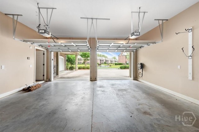 2604 River Oaks Dr Unit 2604, Richmond Hill, GA 31324 - garage featuring a garage door opener