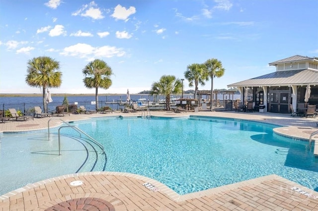 2604 River Oaks Dr Unit 2604, Richmond Hill, GA 31324 - community pool with a patio