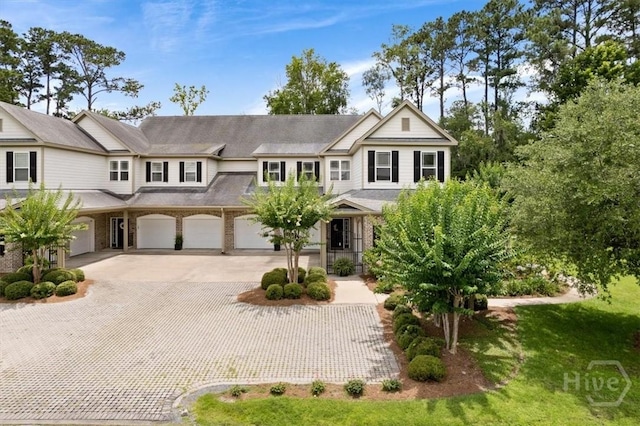 2604 River Oaks Dr Unit 2604, Richmond Hill, GA 31324 - view of property featuring driveway and a garage
