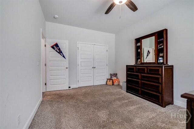 1652 Belle Island Rd, Richmond Hill, GA 31324 - bedroom with carpet flooring, a closet, and a ceiling fan