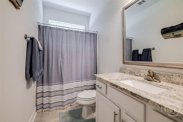 1652 Belle Island Rd, Richmond Hill, GA 31324 - full bath featuring vanity, tile patterned flooring, and a shower with curtain
