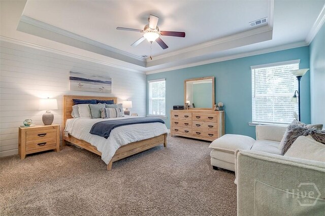 1652 Belle Island Rd, Richmond Hill, GA 31324 - bedroom with a raised ceiling, ornamental molding, light carpet, and a ceiling fan