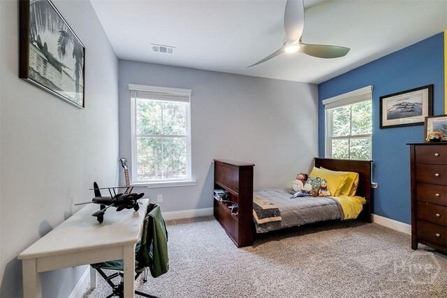 1652 Belle Island Rd, Richmond Hill, GA 31324 - carpeted bedroom with baseboards and a ceiling fan