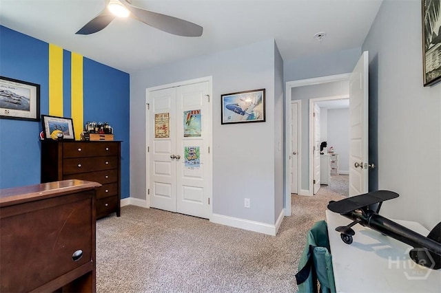 1652 Belle Island Rd, Richmond Hill, GA 31324 - bedroom with light colored carpet, a closet, and a ceiling fan