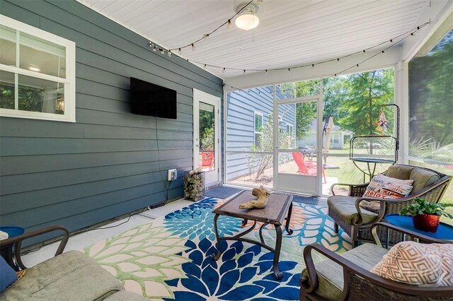 1652 Belle Island Rd, Richmond Hill, GA 31324 - sunroom with rail lighting