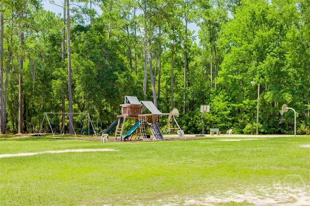 1652 Belle Island Rd, Richmond Hill, GA 31324 - communal playground featuring a lawn