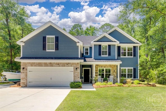 1652 Belle Island Rd, Richmond Hill, GA 31324 - view of front of house with an attached garage, concrete driveway, a front lawn, covered porch, and brick siding