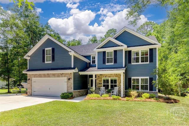 1652 Belle Island Rd, Richmond Hill, GA 31324 - craftsman-style house featuring covered porch, an attached garage, brick siding, driveway, and a front lawn