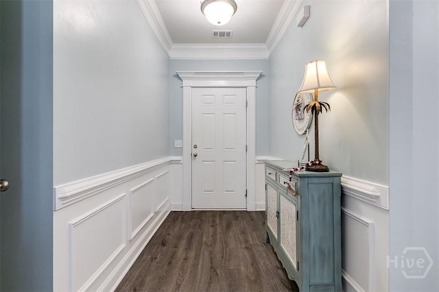 1652 Belle Island Rd, Richmond Hill, GA 31324 - doorway to outside featuring crown molding, dark wood finished floors, and a wainscoted wall