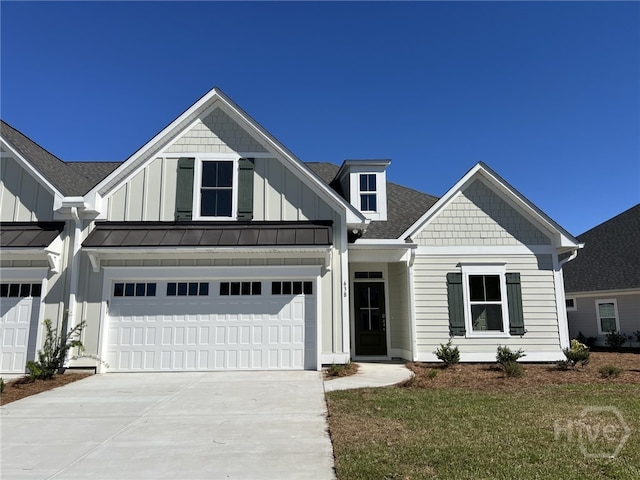 661 Blue Moon Xing, Pooler, GA 31322 - view of front of house featuring board and batten siding, driveway, a shingled roof, an attached garage, and a front yard