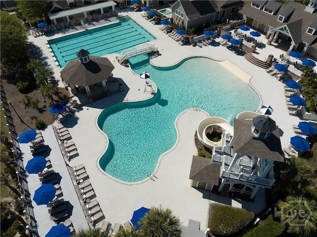 661 Blue Moon Xing, Pooler, GA 31322 - community pool with a patio area