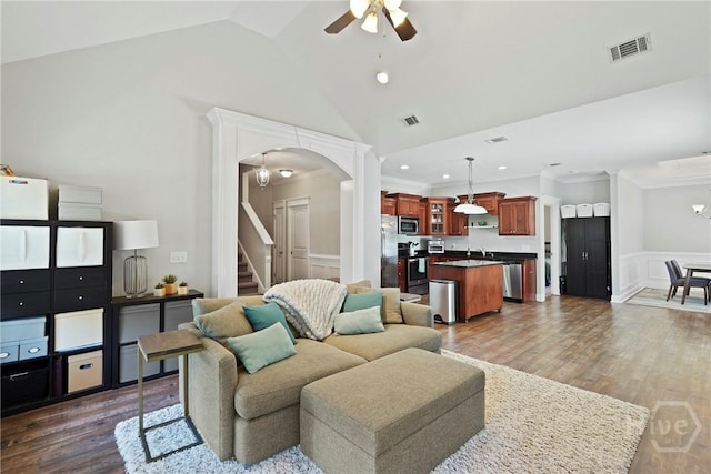 1226 Peacock Trl, Hinesville, GA 31313 - living area with a ceiling fan, arched walkways, wainscoting, dark wood finished floors, and recessed lighting