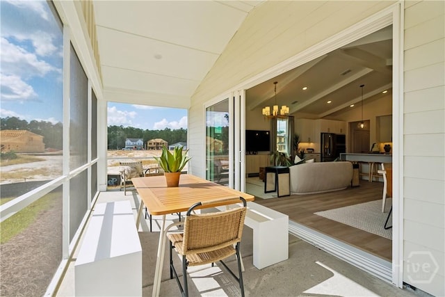 117 Mage St, Savannah, GA 31302 - sunroom / solarium with vaulted ceiling, healthy amount of natural light, and a chandelier