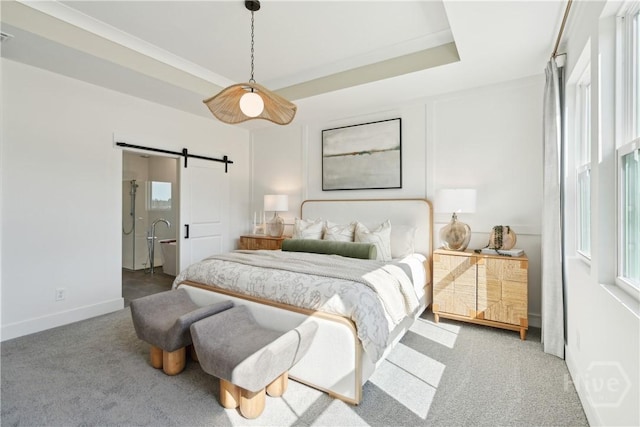 117 Mage St, Savannah, GA 31302 - carpeted bedroom featuring a barn door and baseboards