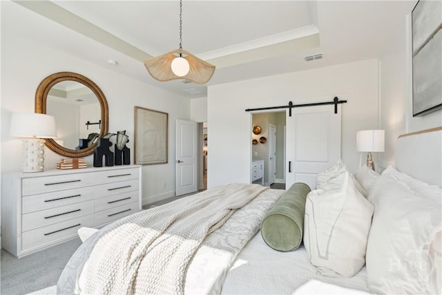 117 Mage St, Savannah, GA 31302 - bedroom with light colored carpet, a barn door, ceiling fan, and ensuite bathroom