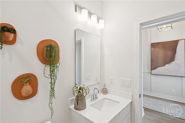 117 Mage St, Savannah, GA 31302 - half bath featuring vanity and wood finished floors