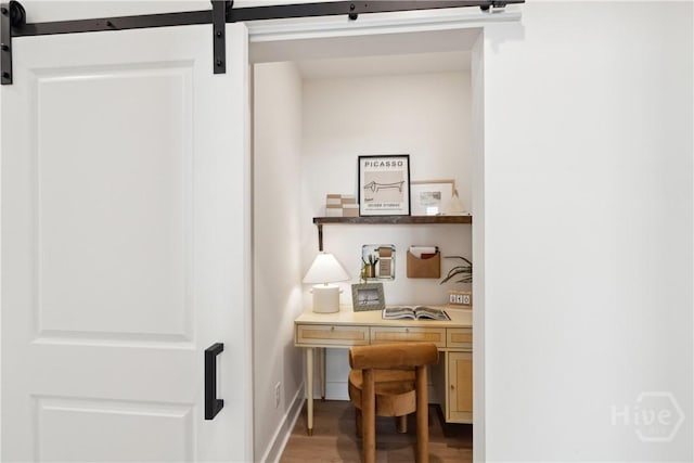 117 Mage St, Savannah, GA 31302 - home office with a barn door and wood finished floors