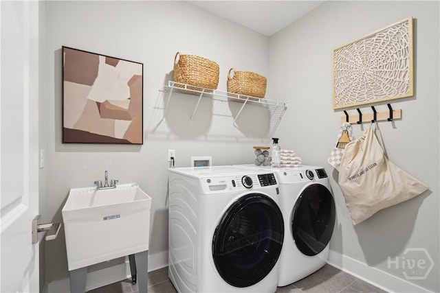 117 Mage St, Savannah, GA 31302 - washroom with washer and clothes dryer and tile patterned floors