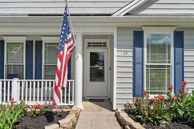25 Savannah Ln, Richmond Hill, GA 31324 - view of exterior entry with covered porch