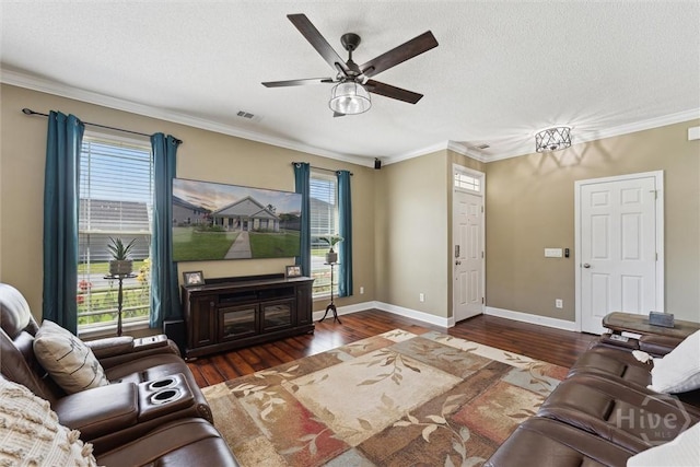 25 Savannah Ln, Richmond Hill, GA 31324 - living room with a ceiling fan, hardwood / wood-style floors, a textured ceiling, and crown molding