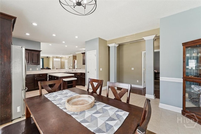 25 Savannah Ln, Richmond Hill, GA 31324 - dining area with recessed lighting, light tile patterned flooring, and decorative columns