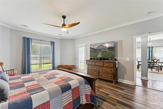 25 Savannah Ln, Richmond Hill, GA 31324 - bedroom featuring wood finished floors, crown molding, a textured ceiling, and ceiling fan