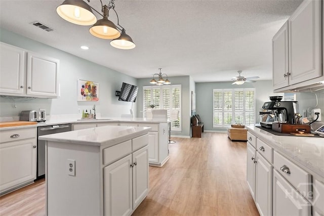 144 Summer Winds Dr, Savannah, GA 31410 - kitchen with dishwasher, a peninsula, light wood-type flooring, ceiling fan, and recessed lighting