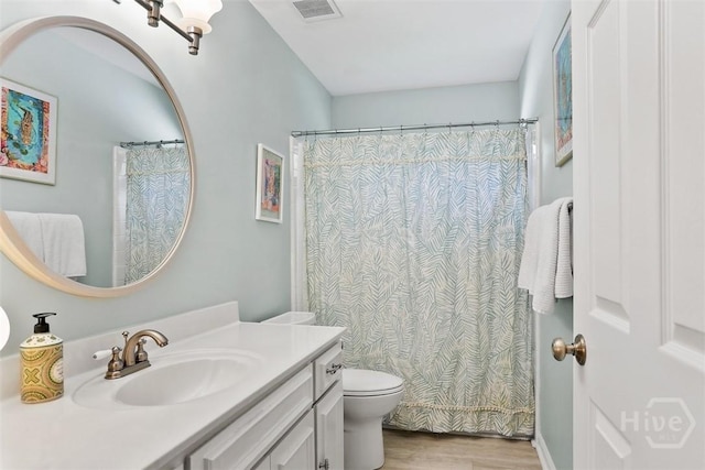 144 Summer Winds Dr, Savannah, GA 31410 - full bathroom with wood finished floors, vanity, and a shower with curtain