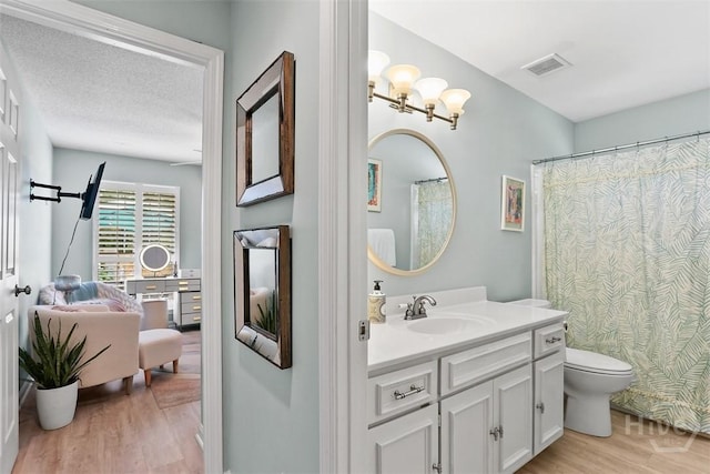 144 Summer Winds Dr, Savannah, GA 31410 - bathroom with wood finished floors, vanity, a chandelier, and curtained shower