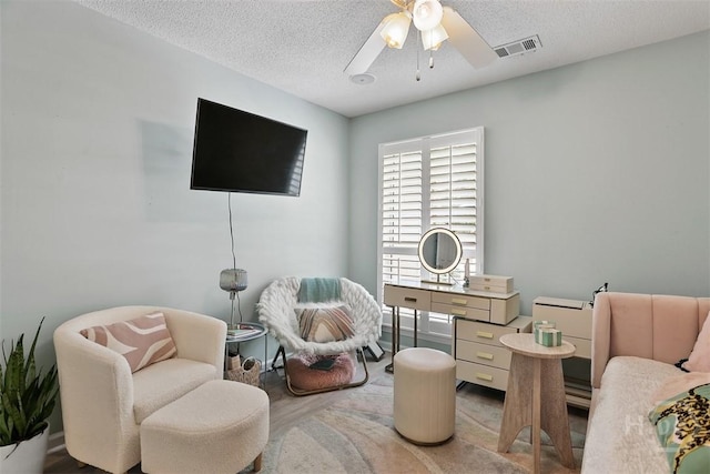 144 Summer Winds Dr, Savannah, GA 31410 - sitting room featuring a ceiling fan, a textured ceiling, and wood finished floors