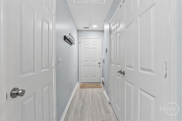 144 Summer Winds Dr, Savannah, GA 31410 - corridor featuring attic access and light wood-style flooring