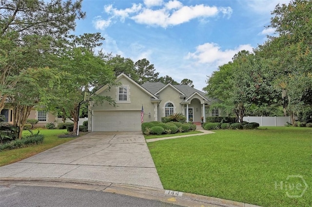 144 Summer Winds Dr, Savannah, GA 31410 - view of front of property featuring stucco siding, driveway, and an attached garage